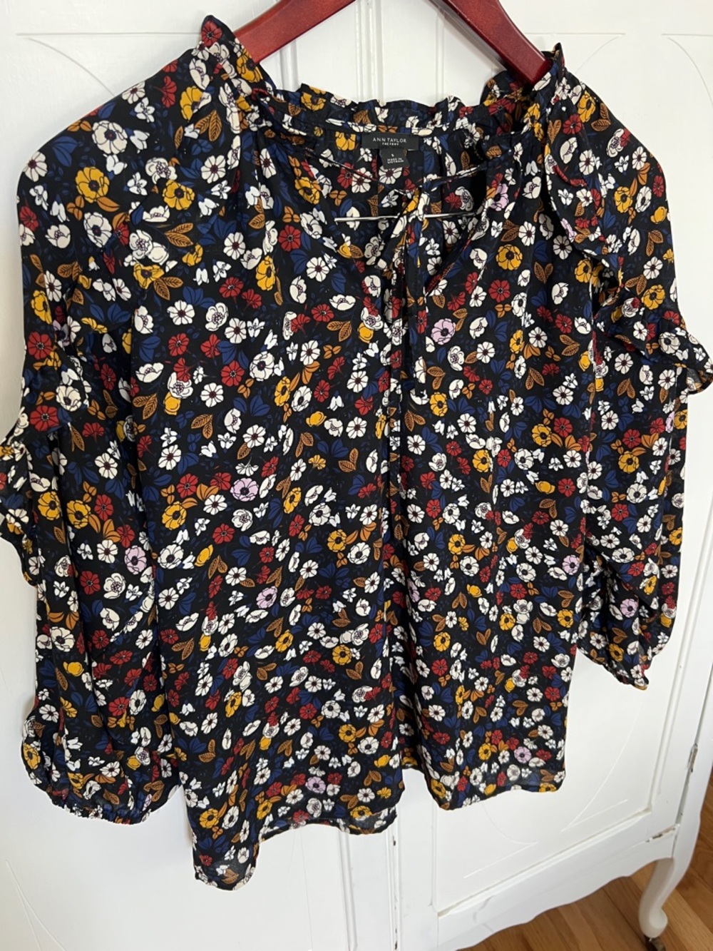 2/$7 Ann Taylor Navy Floral Tie-Neck Blouse with ruffle detail